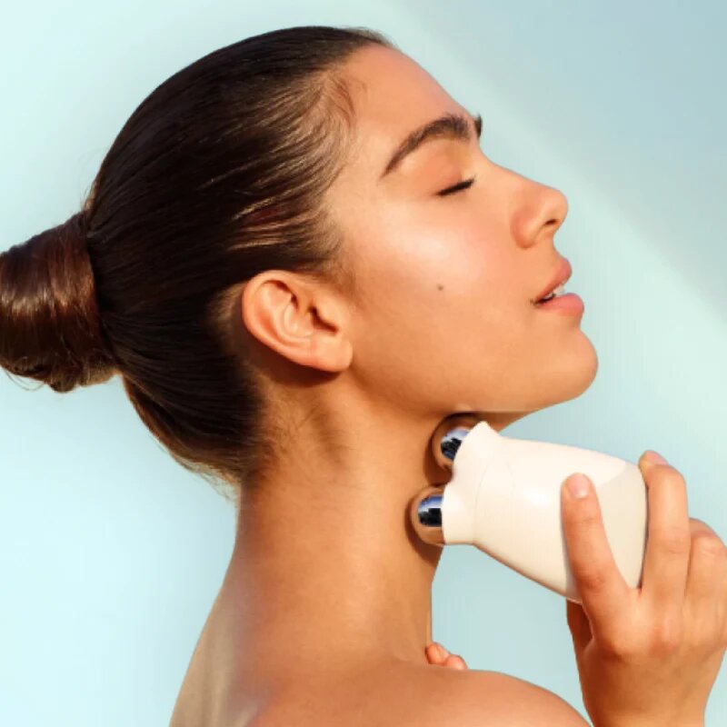 A lady using Microcurrent Facial Sculptor